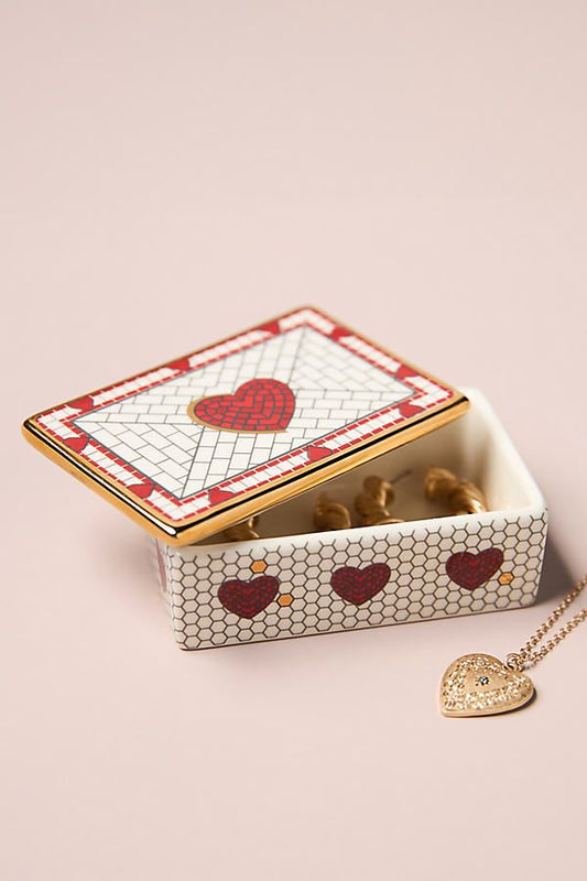 white box with heart on the pink background