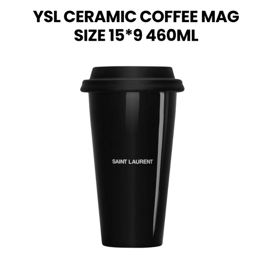 Black ceramic coffee mug with 'Saint Laurent' branding on a white background