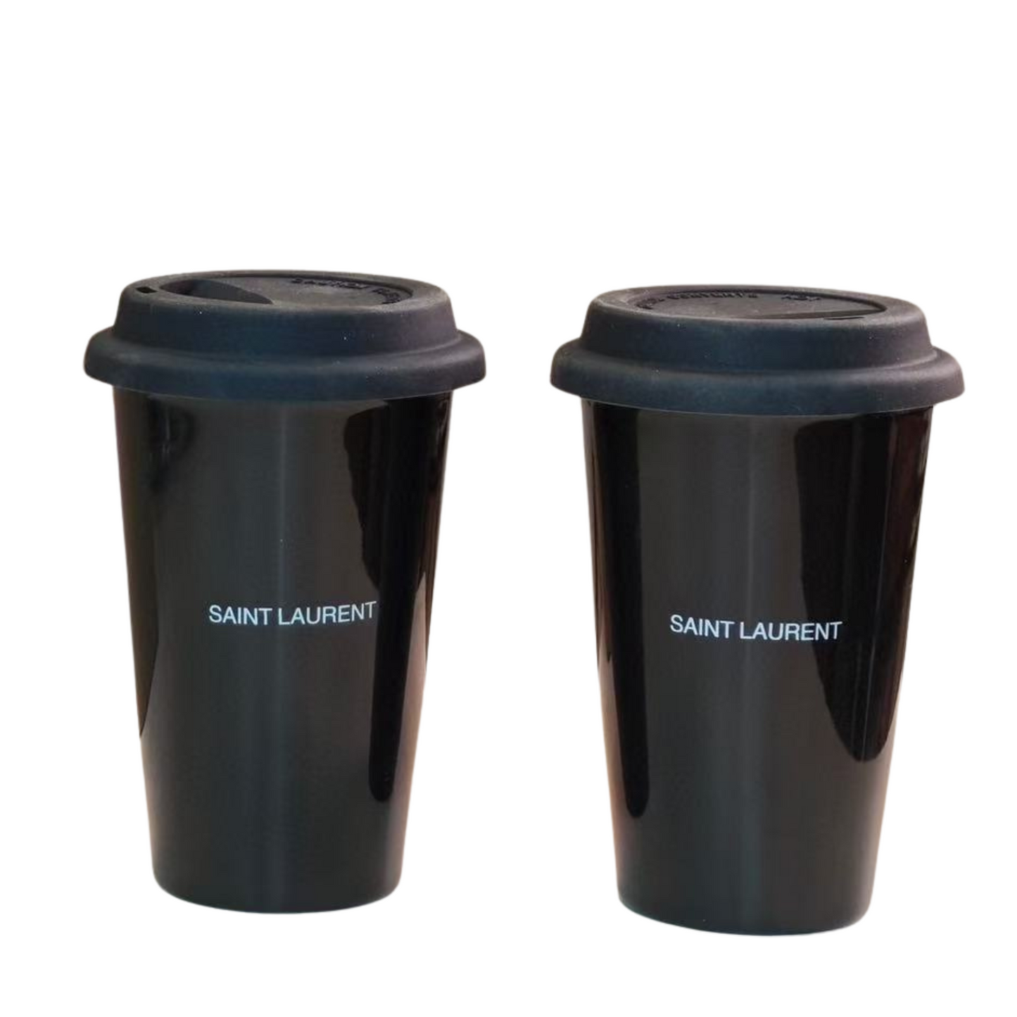 Two black travel mugs with Saint Laurent branding on a white background, surpriseboxgift.com, luxury gift, black gift cup