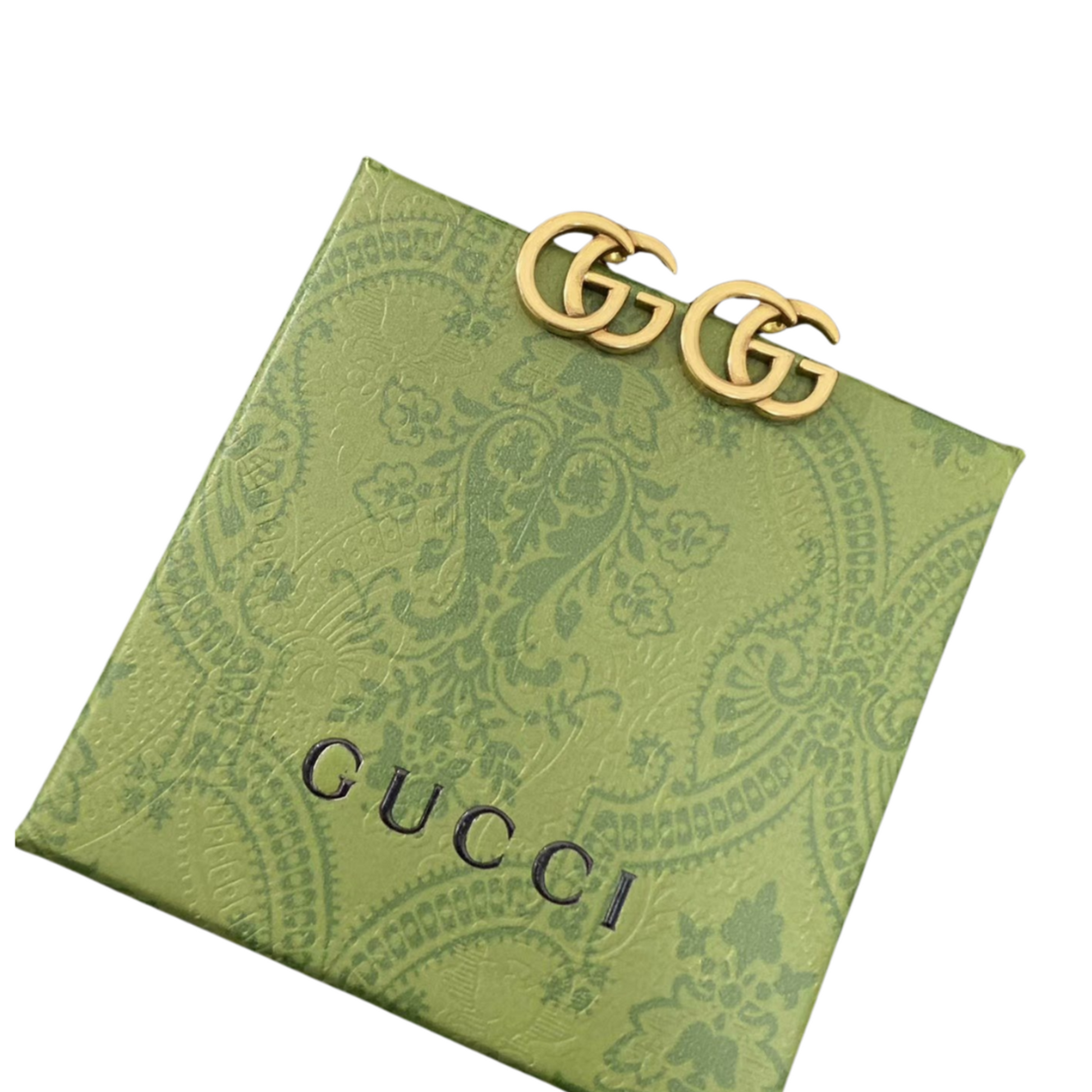 Gold Gucci earrings on a white card with 'Gucci' branding. vintage gucci earrings, surpriseboxgift.com, vintage