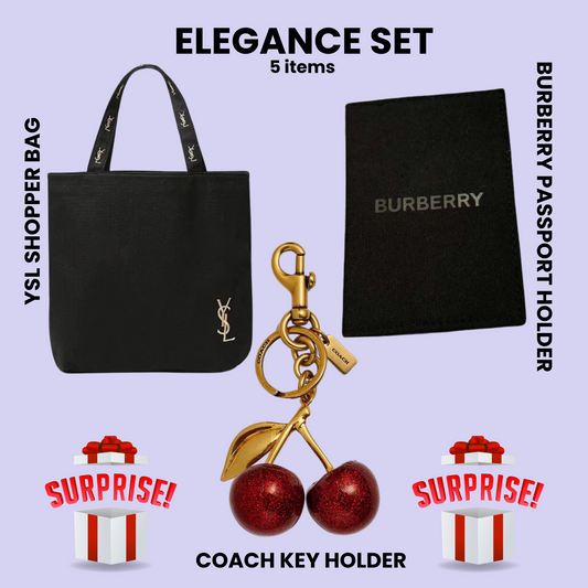 Elegance Set featuring YSL shopper bag, Burberry passport holder, Coach cherry keychain, and two surprise gift boxes on lavender background.
#EleganceSet #YSLBag #BurberryPassportHolder #CoachKeychain #LuxuryAccessories #DesignerBundle #FashionEssentials #SurpriseGifts #TravelInStyle #PremiumGifting