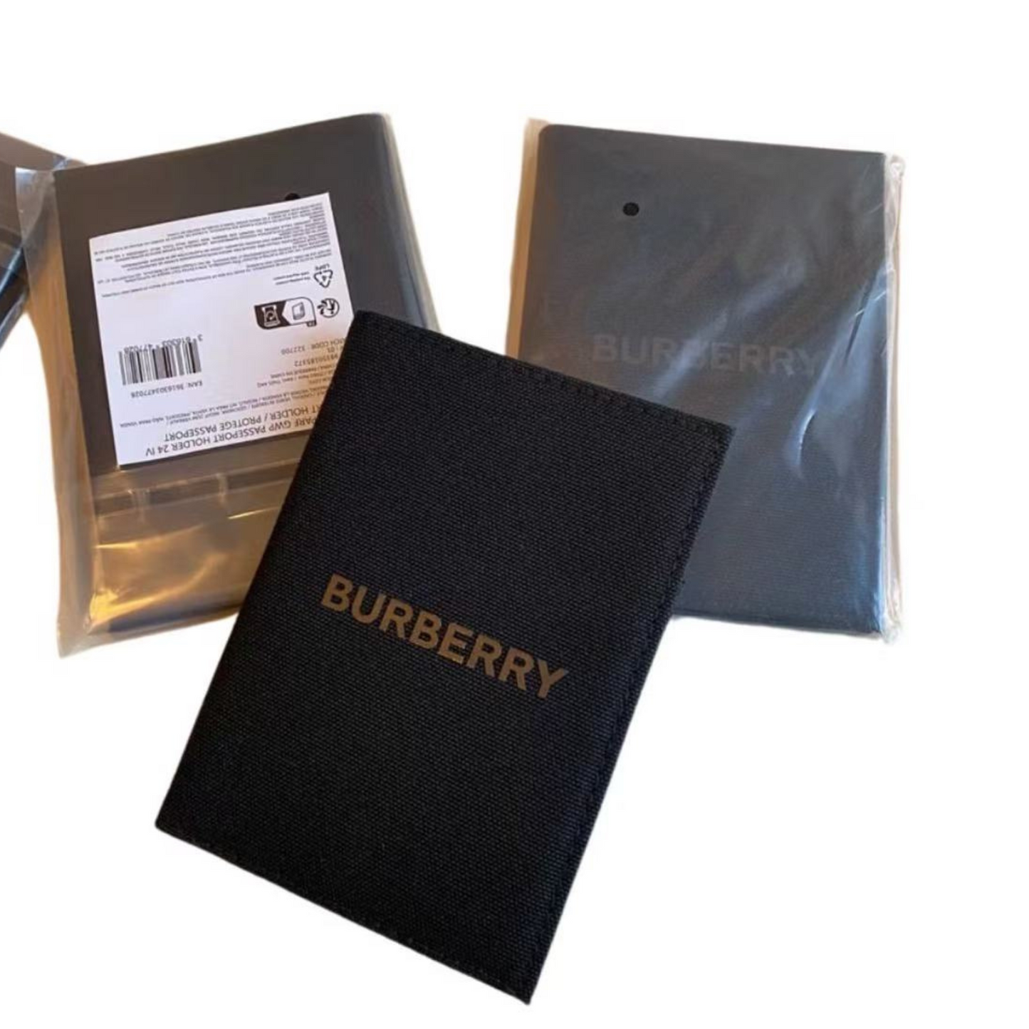 Black Burberry passport cover on a white background, surpriseboxgift.com ideas for gift man and woman, christmas gift, womens gift, corporate gift, birthday gift, luxury gift,